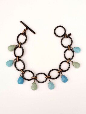 Premier Designs textured toggle close bracelet with blue and sage beads